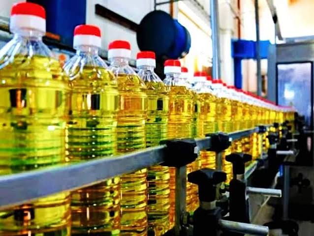 Edible oil bottles and cooking oil representing food and beverage processing industry
